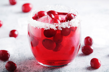 Glasses with red cranberry cocktail	