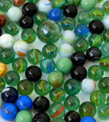 Fototapeta na wymiar Colored glass balls on 360 degree rotating stand,