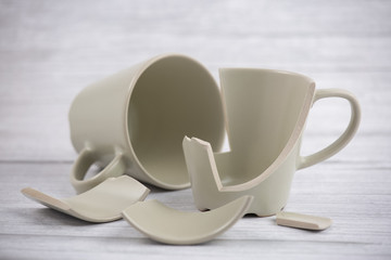 Broken Plate or broken glass and dish on the on the floor in the kitchen The concept of accidents...