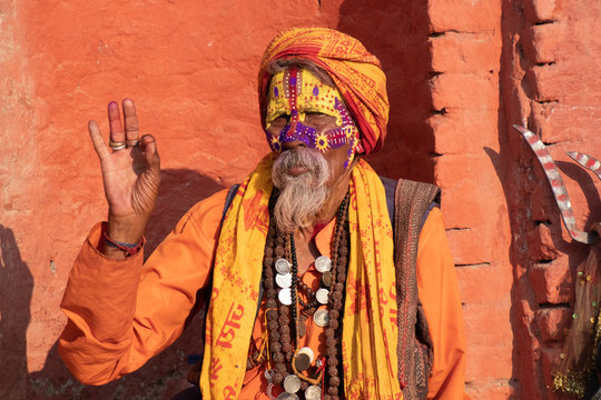 Kathmandu Sadhu men holy person in hinduism with traditional painted face at Pashupatinath Temple of Kathmandu
