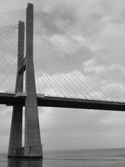 Detail of the Vasco de Gama Bridge in Lisbon on a cloudy day.