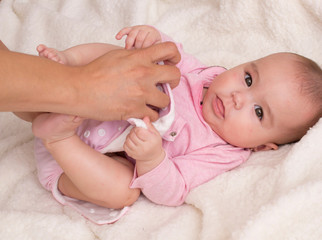 baby changing cloth diaper, little girl