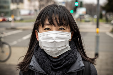 Japanese woman using medical face mask