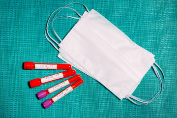 The vaccine for Coronavirus. Positive blood Tests for Coronavirus in test tubes.