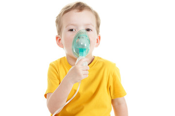 Asthma patient, children boy diagnosis asthma inhalation therapy the mask of inhaler. Close up a little kid with respiratory disease problem