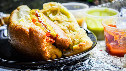 Mega hot dog the traditional from Hermosillo Mexico with hot sauce.