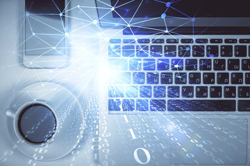 Multi exposure of data theme drawing hologram over topview work desk background with computer. Concept of technology.
