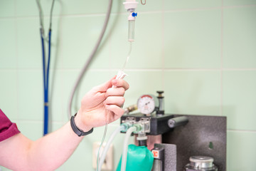 preparing an infusion at a surgical clinic