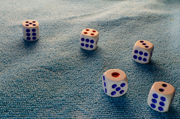 Five dice arranged from one to five