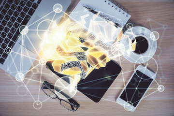 Double exposure of brain drawing over work table desktop. Top view. Global data analysis concept.