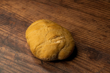 fresh baked bread oaf on a wood board
