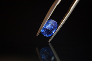 Blue sapphire Gemstone  Expensive blue in a tong