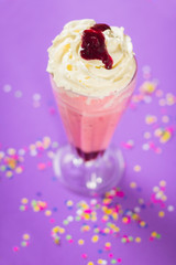 a strawberry milkshake with chantilly