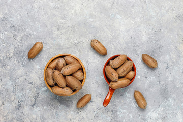 Pecan nuts on light background,top view