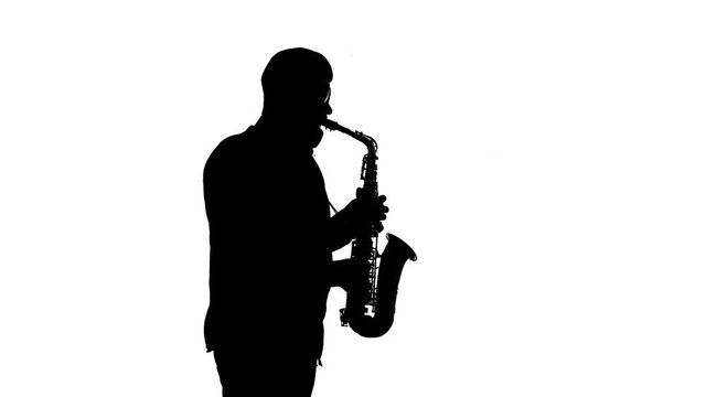 silhouette of a handsome saxophone musician, isolated, solo