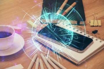 Double exposure of financial theme drawing and cell phone background. Concept of business