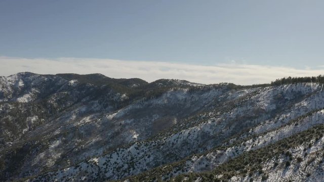 Flying over the high elevation alpine regions of Mt. Lemmon in Tucson, Arizona with snow on the ground.