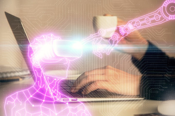 Double exposure of woman hands typing on computer and man in AR glasses drawing. Education concept.