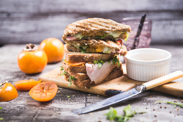 sandwich snack Breakfast sandwich persimmon mustard arugula brie cheese