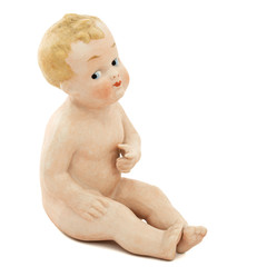 Vintage baby doll from ceramics, isolated on white background