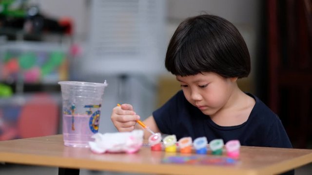 child paint color on paper, education concept
