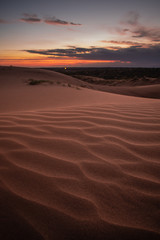 Beautiful sunset over sand dunes