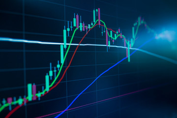 Blue Stock Exchange Market trading graph on screen monitor for economic and financial investment. Business analysis chart display. Stock invest infomation.