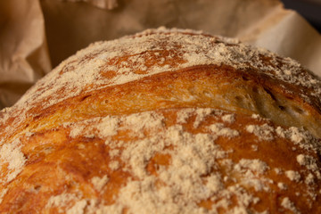 Delicious italian bread on wooden table. Rustic concept.