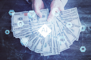 Multi exposure of technology drawing hologram and us dollars bills and man hands. Data concept