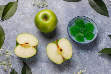 Apple green marmalade candy in sugar. Healthy dessert for gourmets.