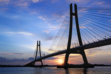 Fototapeta na wymiar Vam Cong Bridge in the early sunshine