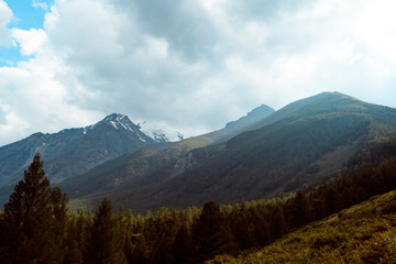thick clouds over rock ridge, bad weather and waiting for rain in  mountains