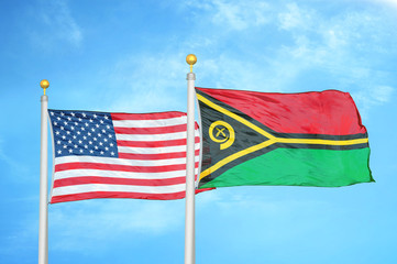 United States and Vanuatu two flags on flagpoles and blue cloudy sky