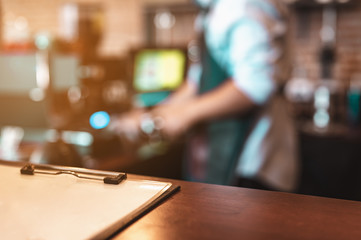 Close-up coffee maker that is professionally extracting coffee by barista with a deep white glass in the evening sun light. coffee, extraction, deep, machine, make, barista concept.