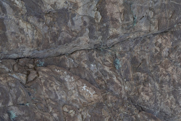 Fototapeta premium granite stone wall, rock face as background, mountain for rock climbers