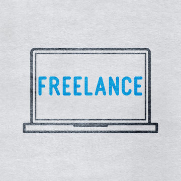 Freelance and laptop icon on grey paper background