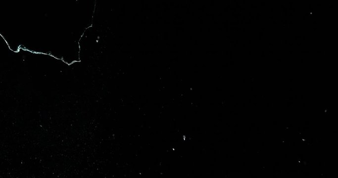 Broken cracks glass fracture effect texture isolated abstract black background. Bullet cracked window with big hole screen mirror weapon shot.