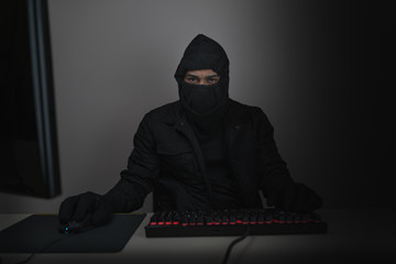 A hacker hacking computers online.