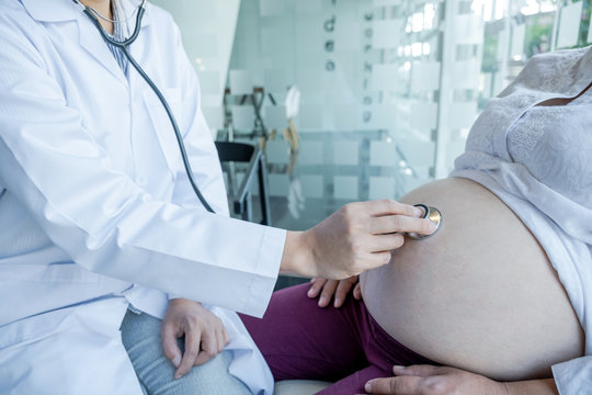 The doctor check the health and advise pregnancy to pregnant women, medical checkup concept