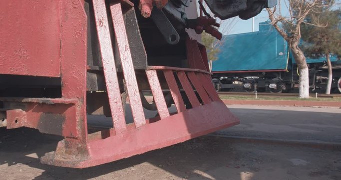 Old steam locomotive safety fence (Jagger); 	Collision protector - Traffic safety system  red color