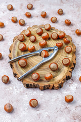 Hazelnuts on concrete background,top view