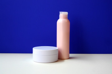 Empty packaging for cosmetics, cream, gel. Human skin care concept.