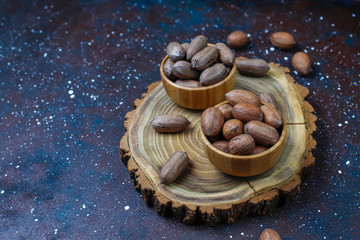 Pecan nuts on light background,top view