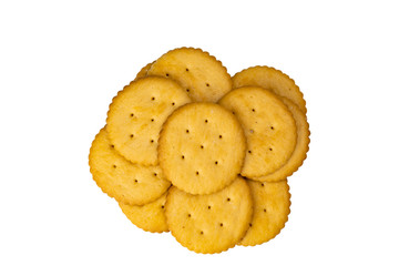 Pile of crunchy round crackers on white background with clipping path.