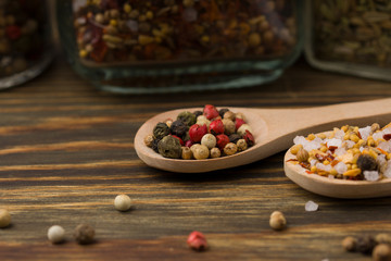 Peppercorn Mix In A Wooden Spoon. Spice background
