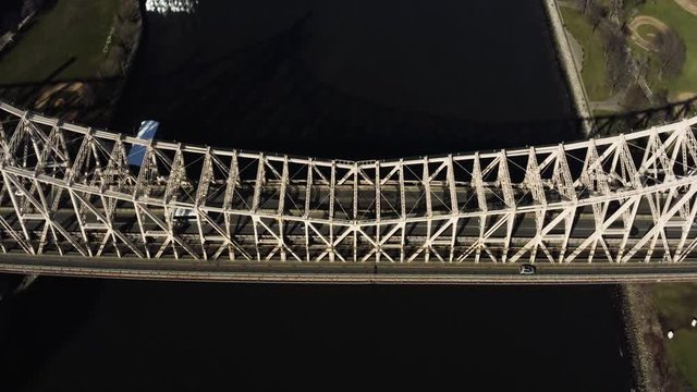 Anamorphic aerial footage of low traffic over the bridge during pandemic