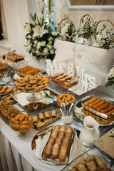 A sweet table with biscuits and candy for a party