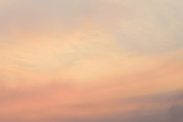 Beautiful vanilla sky with clouds after sunset in the evening