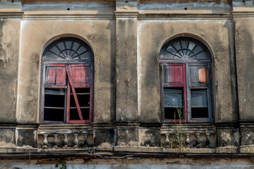 Old wooden windows of The old customs house Or Old bang rak fire station.