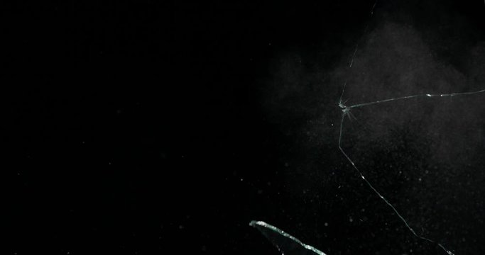 Broken cracks glass fracture effect texture isolated abstract black background. Bullet cracked window with big hole screen mirror weapon shot.